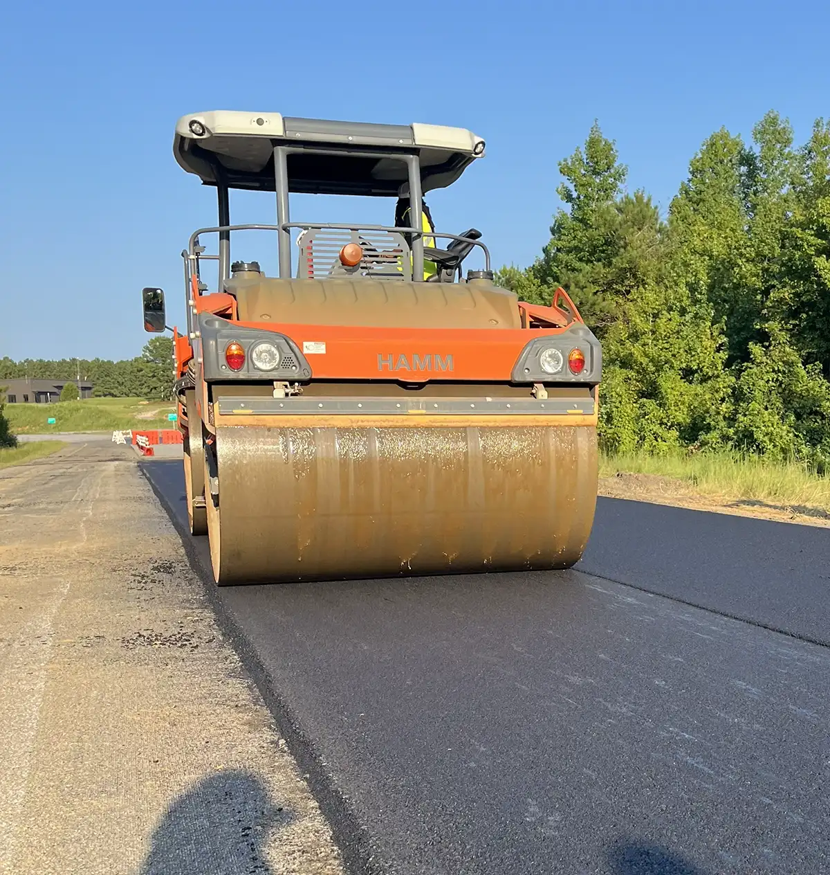 Dry process rubberized asphalt being placed