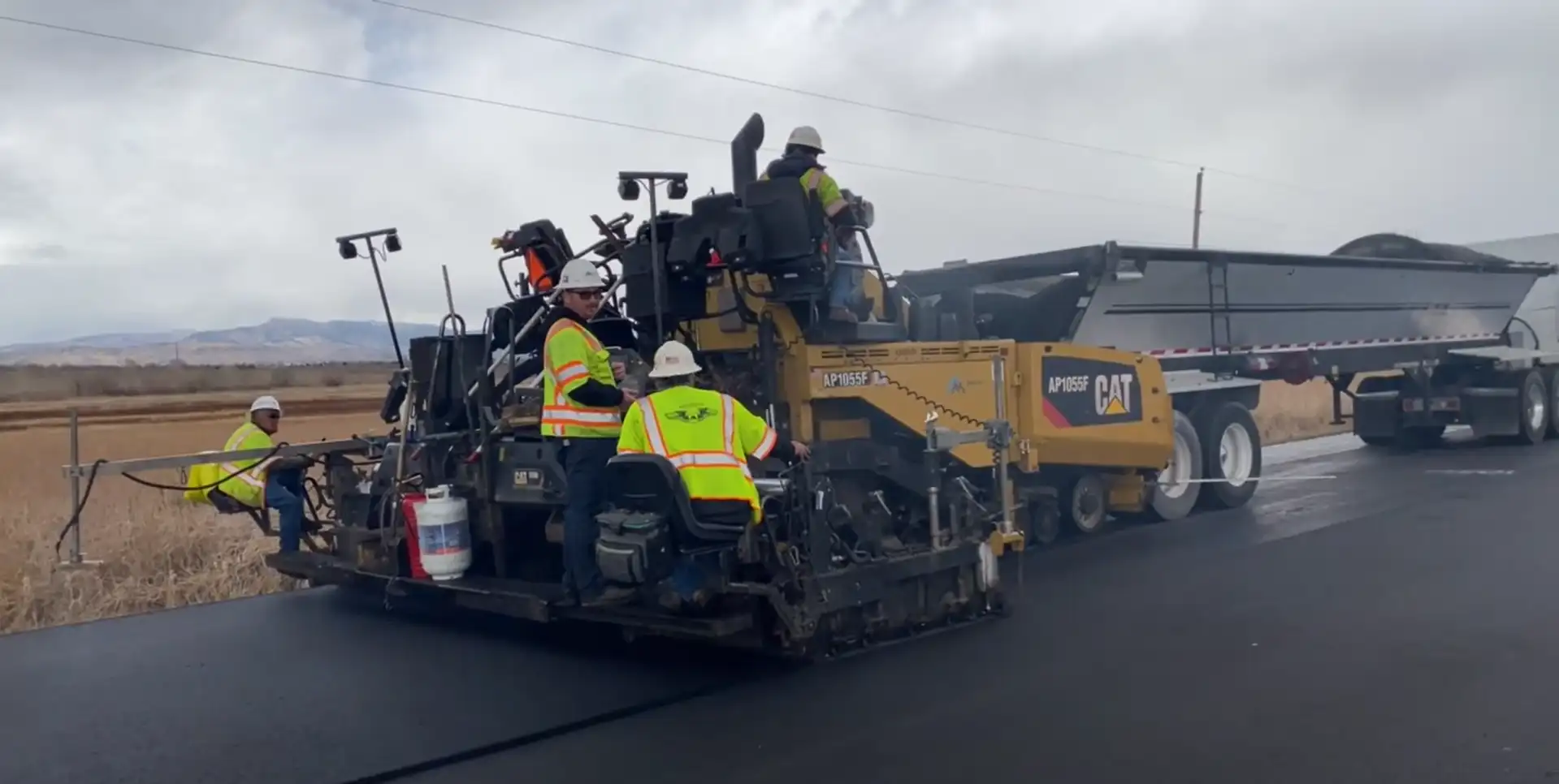 Ground tire rubber asphalt pavement surface modified with dry process ECR for improved pavement performance